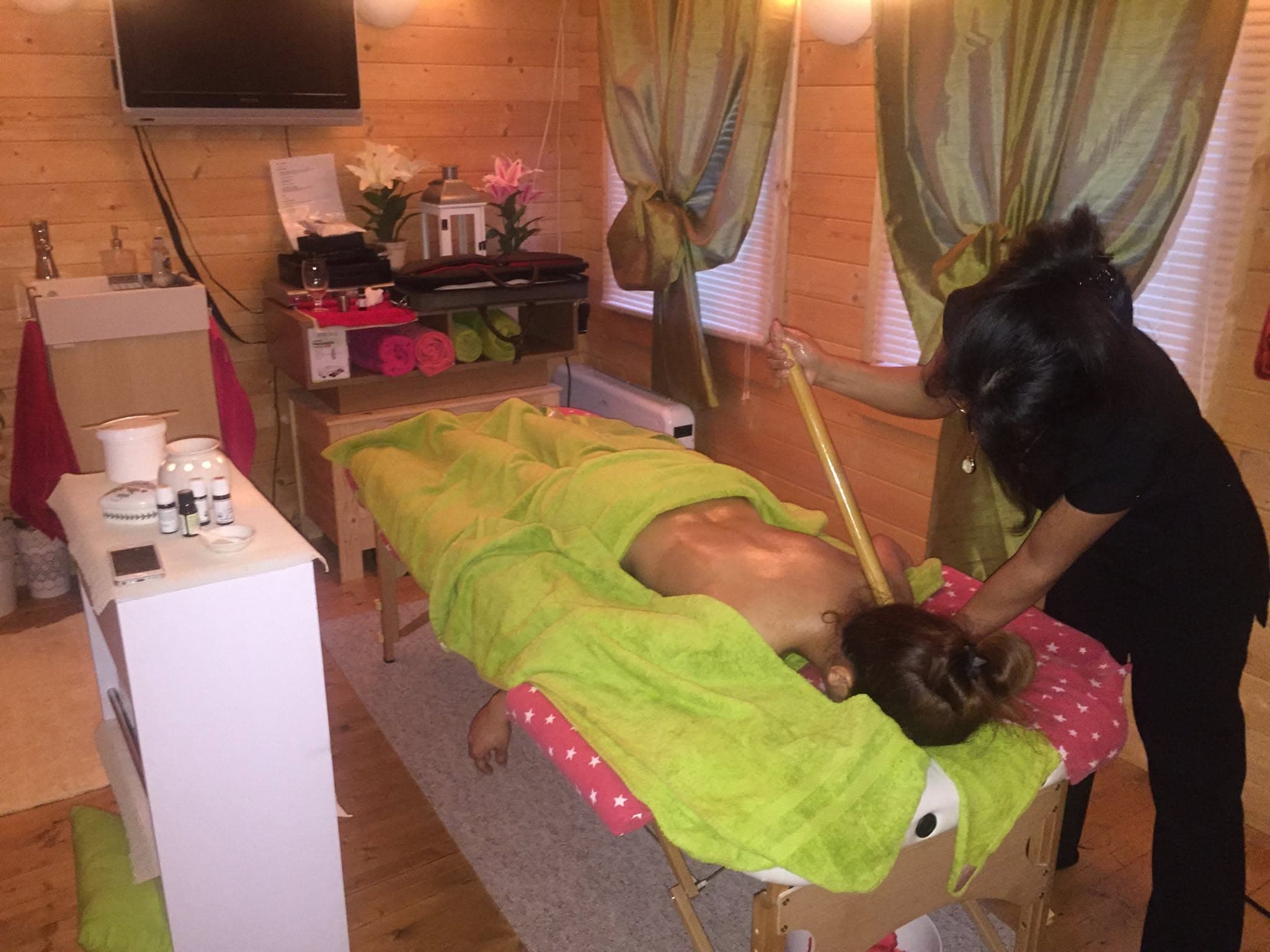 Treatment in progress at the Essential Massage log cabin studio, Stoke-on-Trent